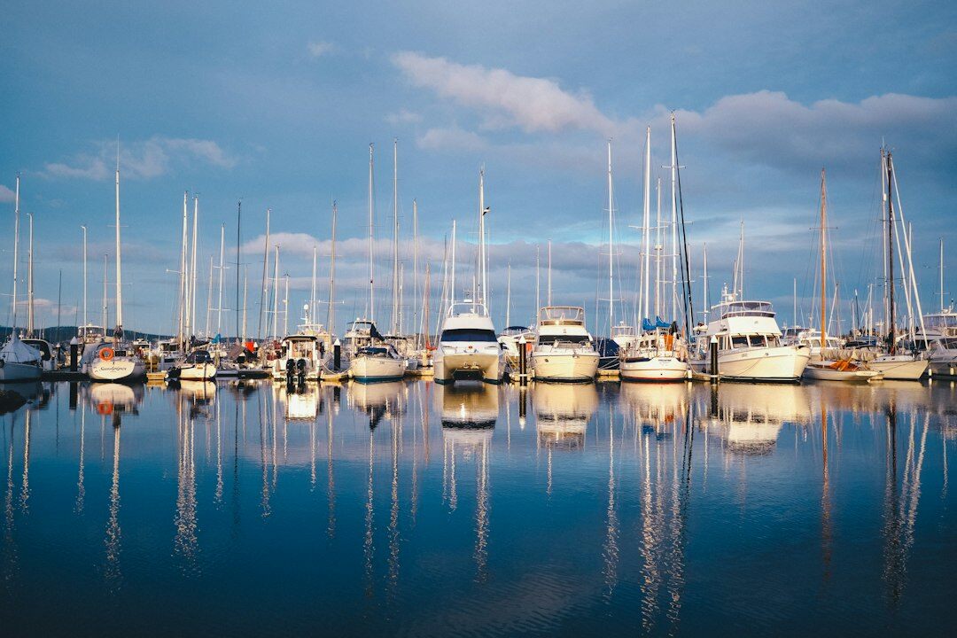 Luxury yachts anchored at the marina of Puerto de Punta del Este at golden hour